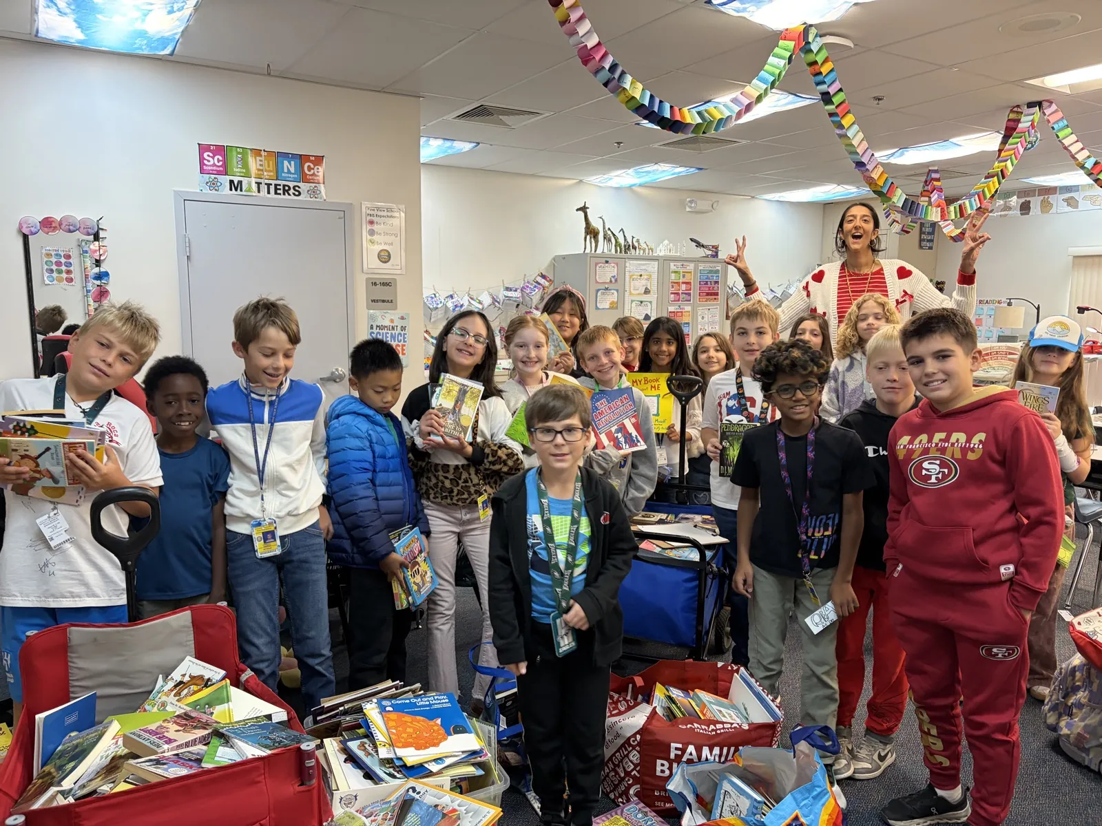 Book sorting, donation drop-off, Free Book Fairs distribution at Tuttle Elementary